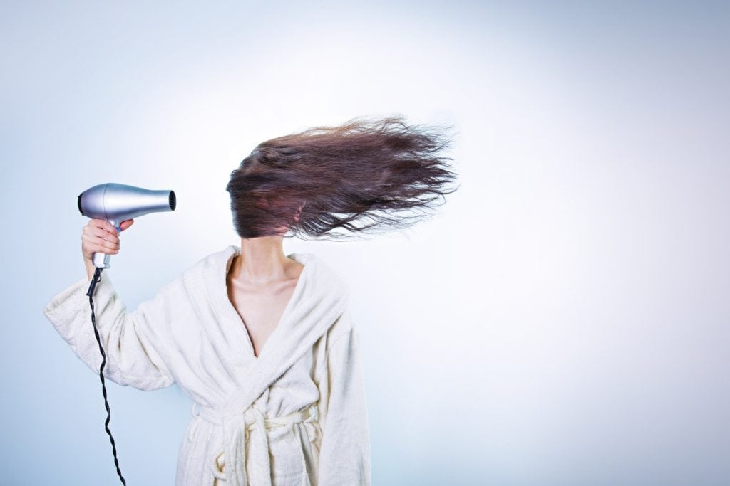 Sailing Trip Packing List
woman with blow dryer