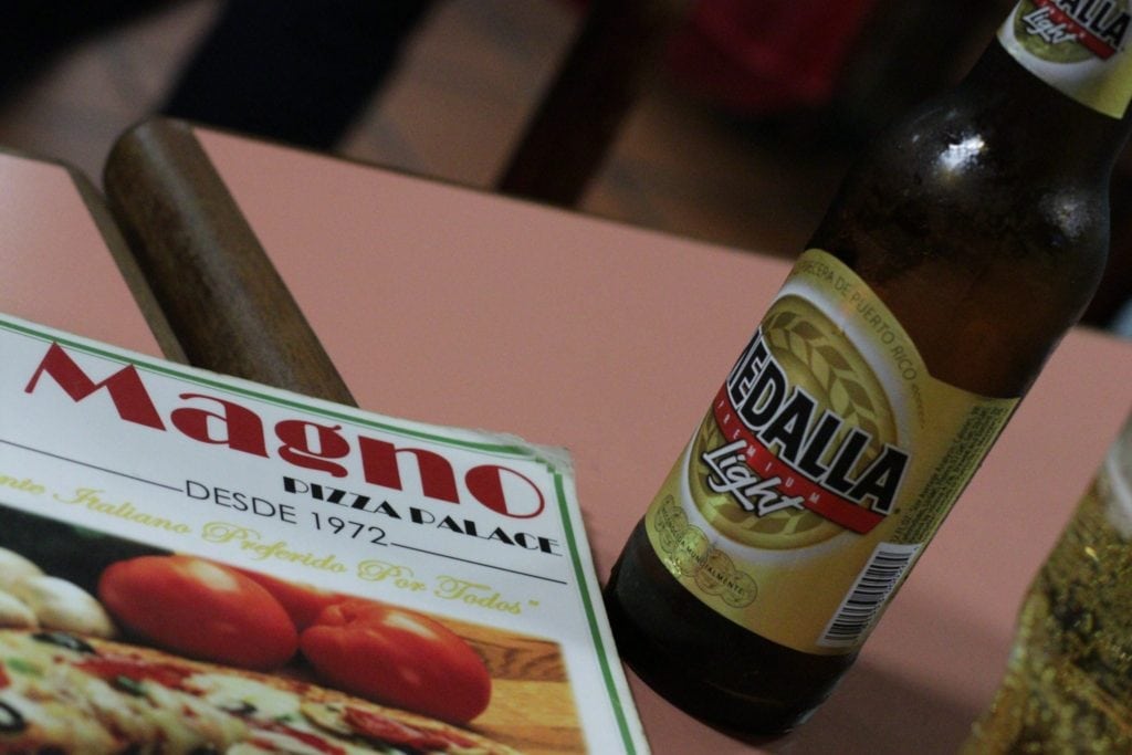 Puerto Rico.  Magno Pizza Palace menu and medalla