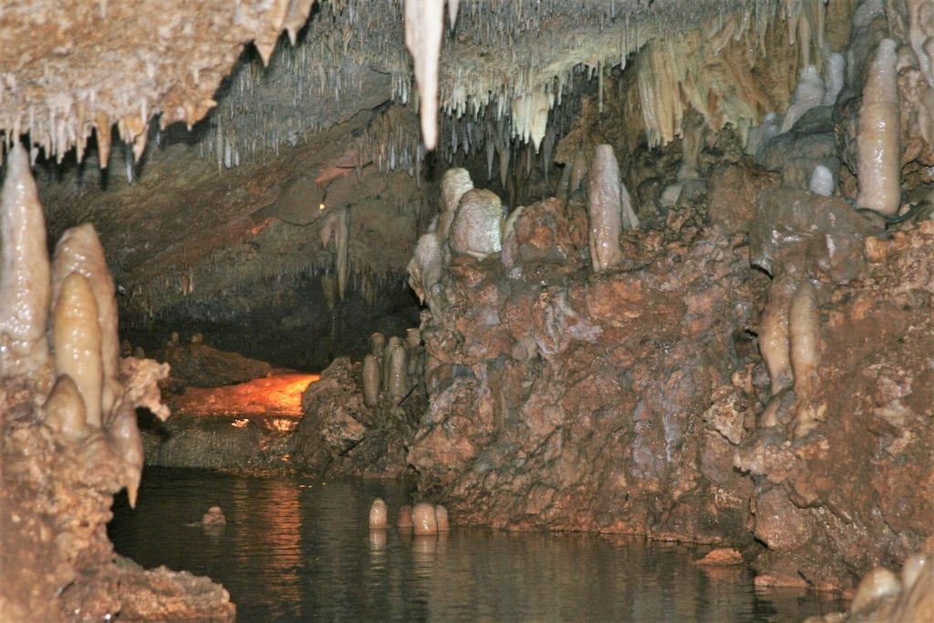 Things to Do In Puerto Rico.  
River running through Camuy Caves